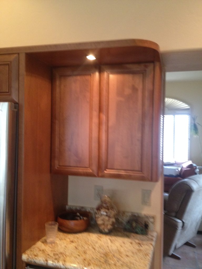 New kitchen cabinet installation with curved lines